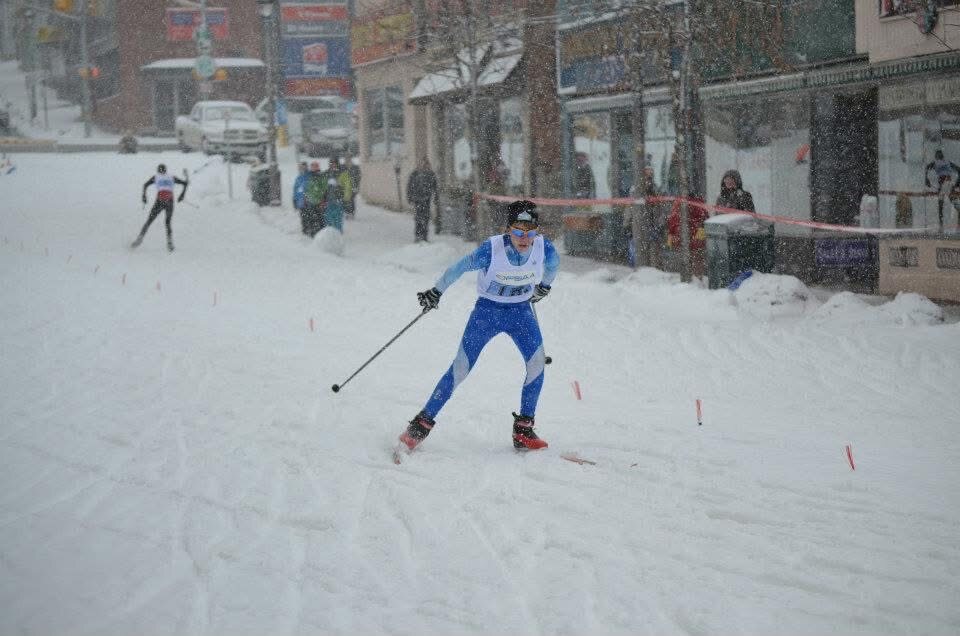 Charles competing in Grade 9 OFSAA cross-country skiing on Huntsville Main Street